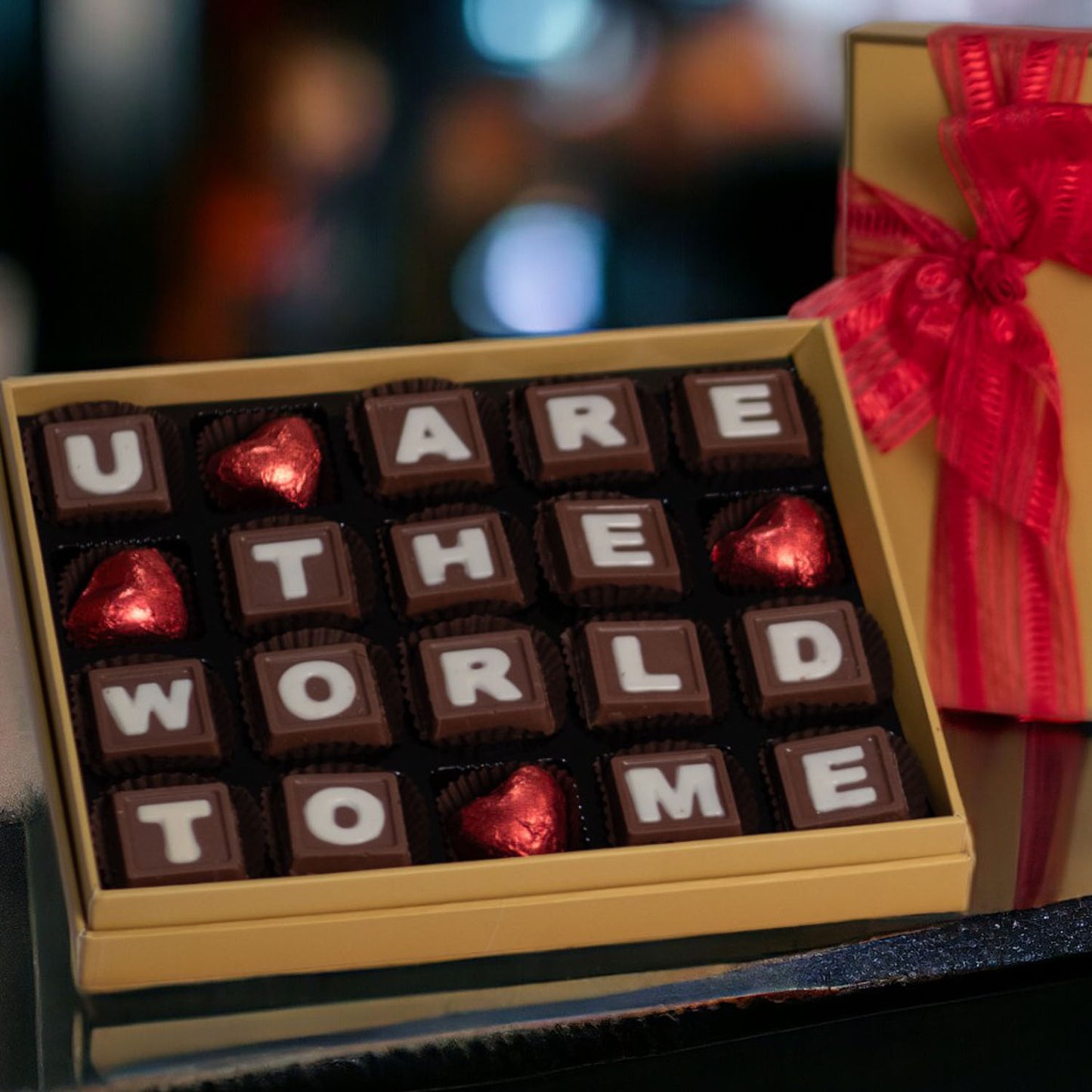 ZOROY Message Box saying U are the WORLD to meA neat and chic box containing 20 milk chocolates. The letters in the box says U mean the World to me. A perfect way to show your love and appreciation to someone who means everything.