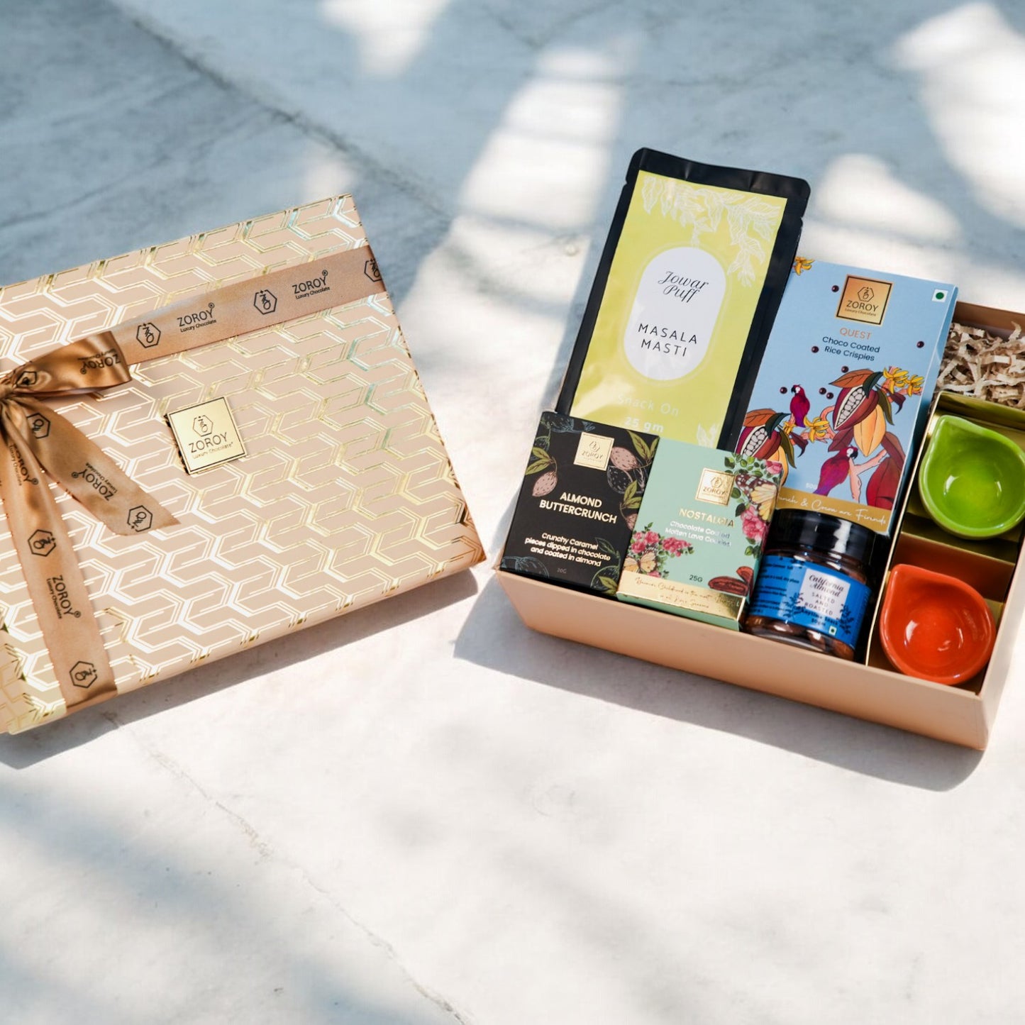 ZOROY Luxury Chocolate Contemporary Hamper Large – Stylish Box pack contains Choco Coated Crispies, Snack pack 1 No, Salted Roasted Almonds, Buttercrunch, Cookies and Set of 2 Diyas – Ideal Gift Set for Festive Corporate Diwali Gifting