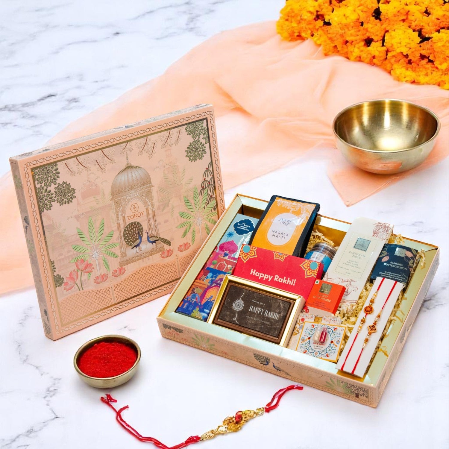 ZOROY Madhubani Rakhi Gift Hamper | Premium Noor Baklawa, Snacks, Almonds, Berries, Chocolates, Buttercrunch, 2 Rakhis, Printed Chocolate Box, Akshat Kumkum & Rakhi Card | Raksha Bandhan Gift