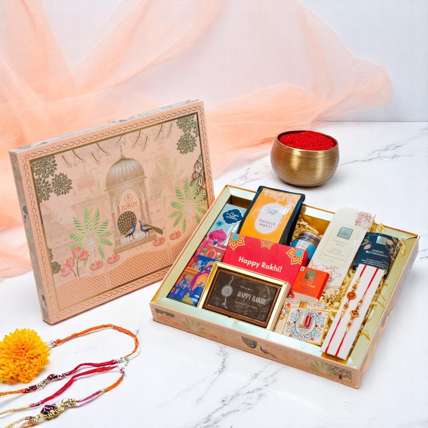 ZOROY Madhubani Rakhi Gift Hamper | Premium Noor Baklawa, Snacks, Almonds, Berries, Chocolates, Buttercrunch, 2 Rakhis, Printed Chocolate Box, Akshat Kumkum & Rakhi Card | Raksha Bandhan Gift