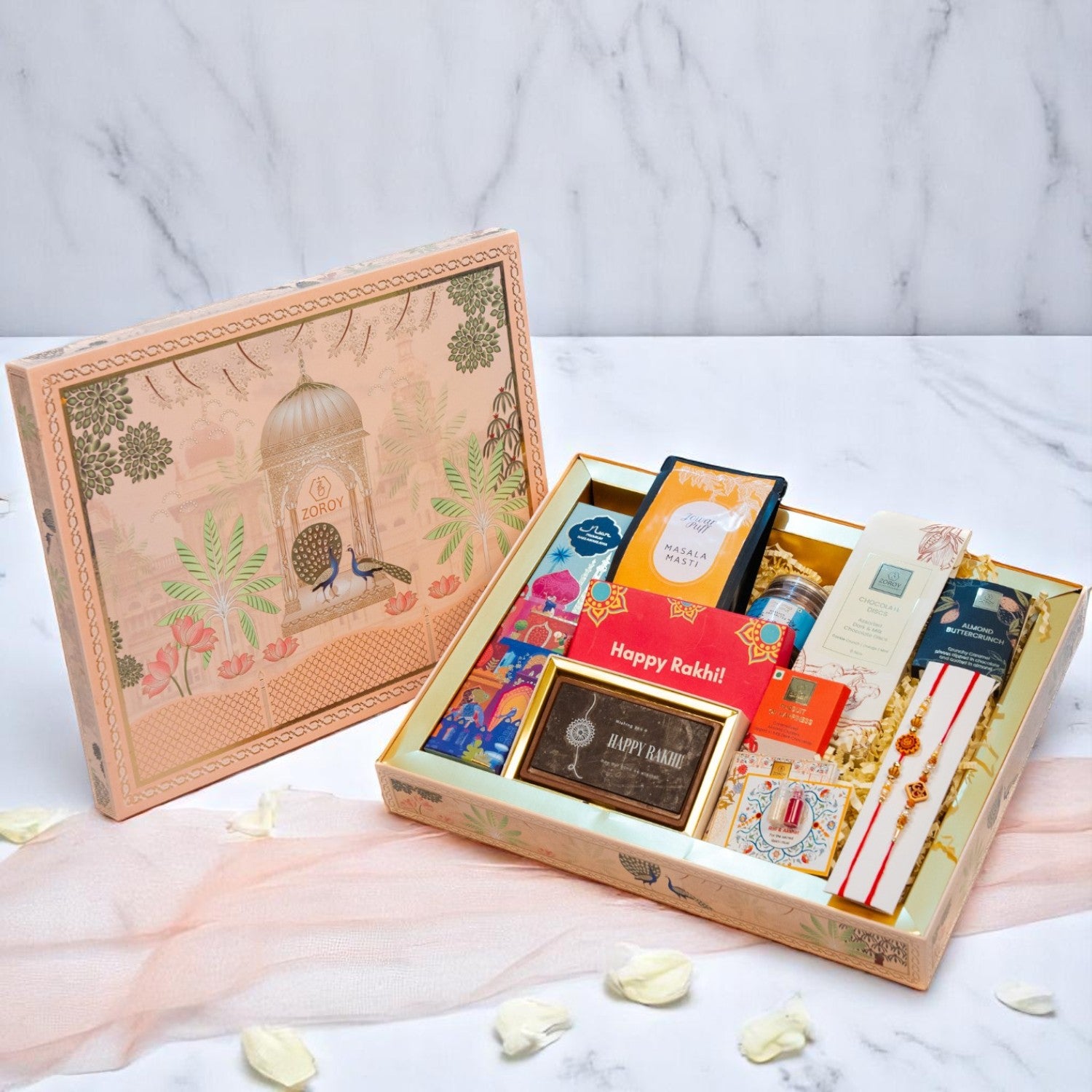 ZOROY Madhubani Rakhi Gift Hamper | Premium Noor Baklawa, Snacks, Almonds, Berries, Chocolates, Buttercrunch, 2 Rakhis, Printed Chocolate Box, Akshat Kumkum & Rakhi Card | Raksha Bandhan Gift