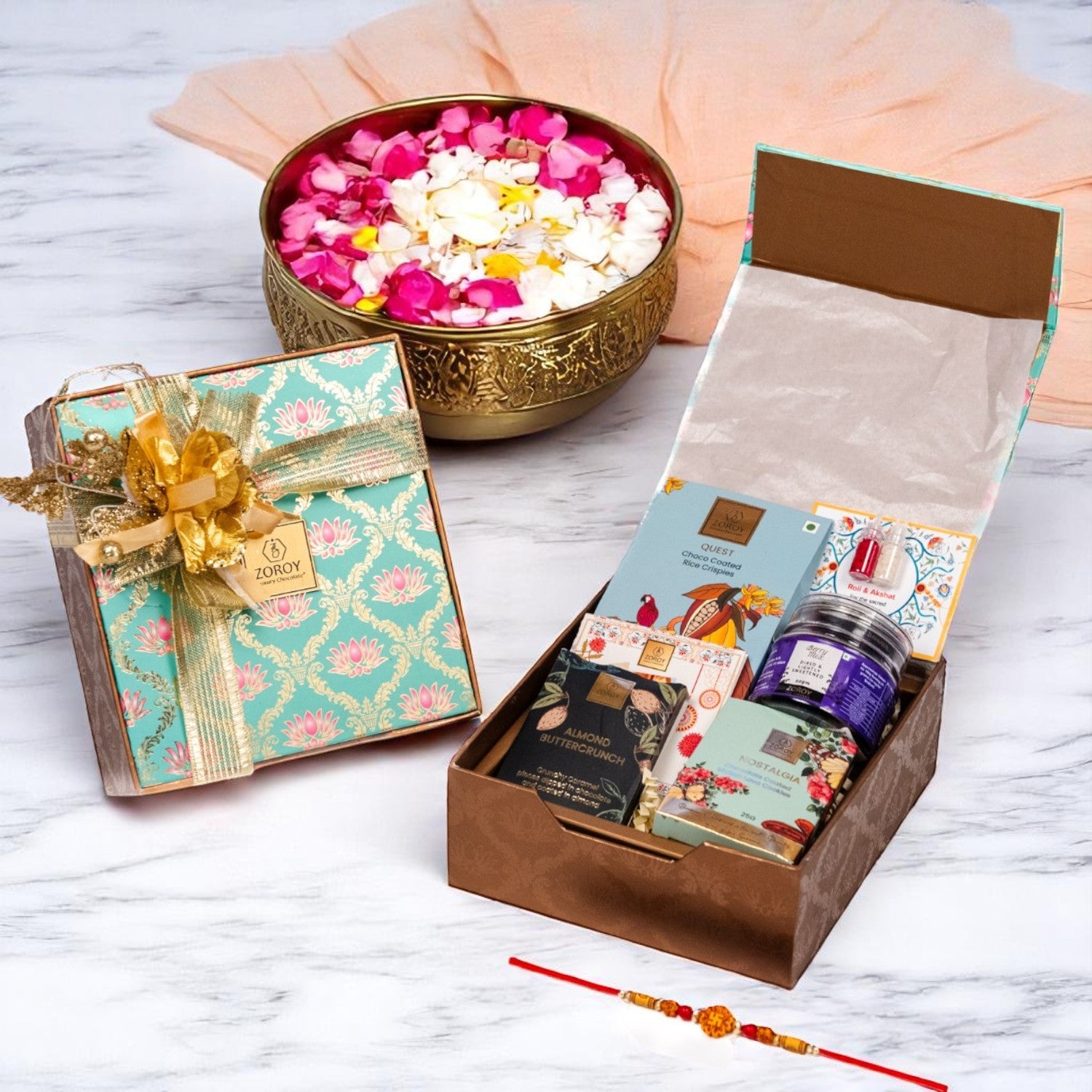 ZOROY Rakhi Celebration Gift Hamper with Chocolate Lava Cookies, Choco Rice Crisps, Buttercrunch Snacks, Mixed Berry Treats, Designer Rakhi, Akshat Kumkum, Rakhi Card – Raksha Bandhan Gift Box