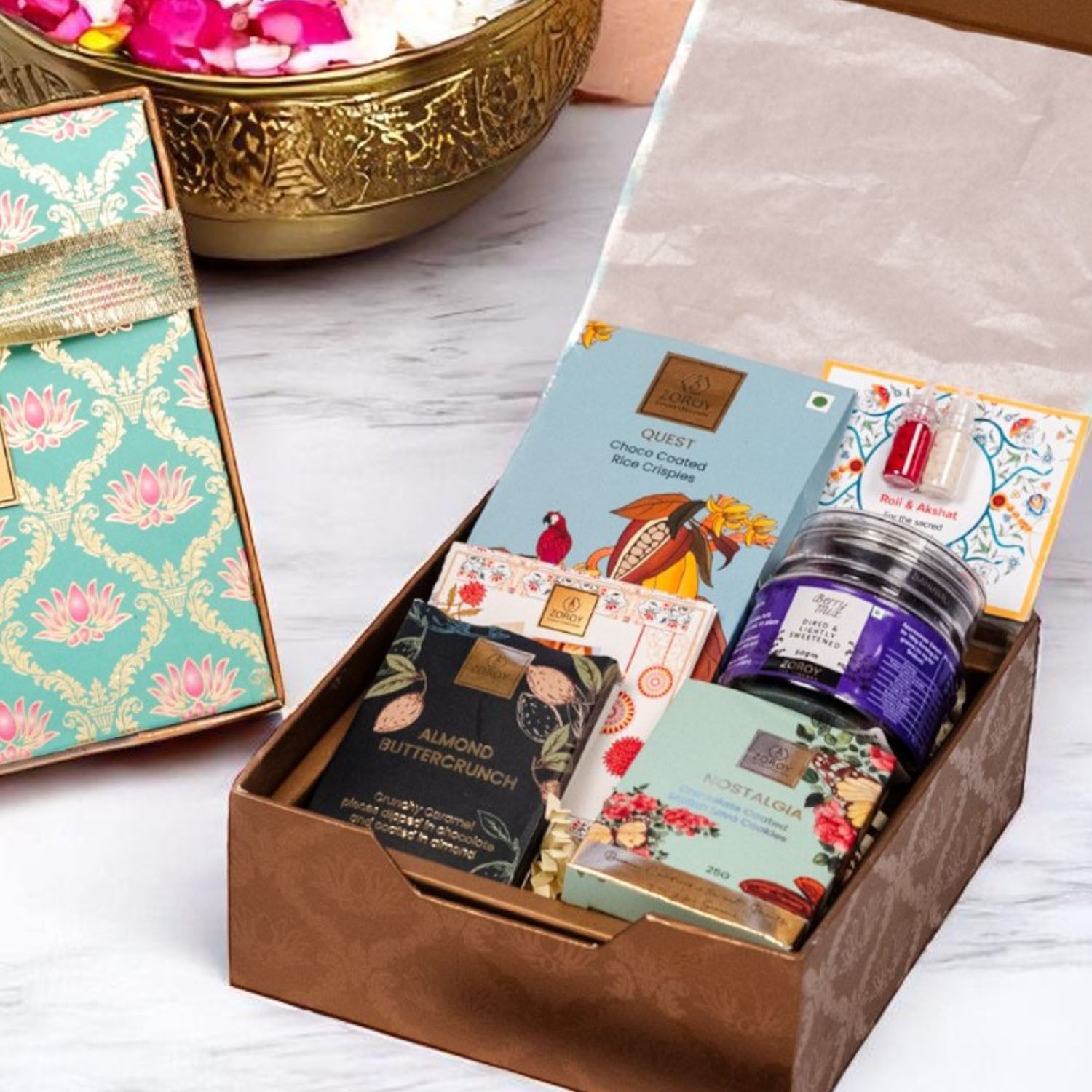 ZOROY Rakhi Celebration Gift Hamper with Chocolate Lava Cookies, Choco Rice Crisps, Buttercrunch Snacks, Mixed Berry Treats, Designer Rakhi, Akshat Kumkum, Rakhi Card – Raksha Bandhan Gift Box
