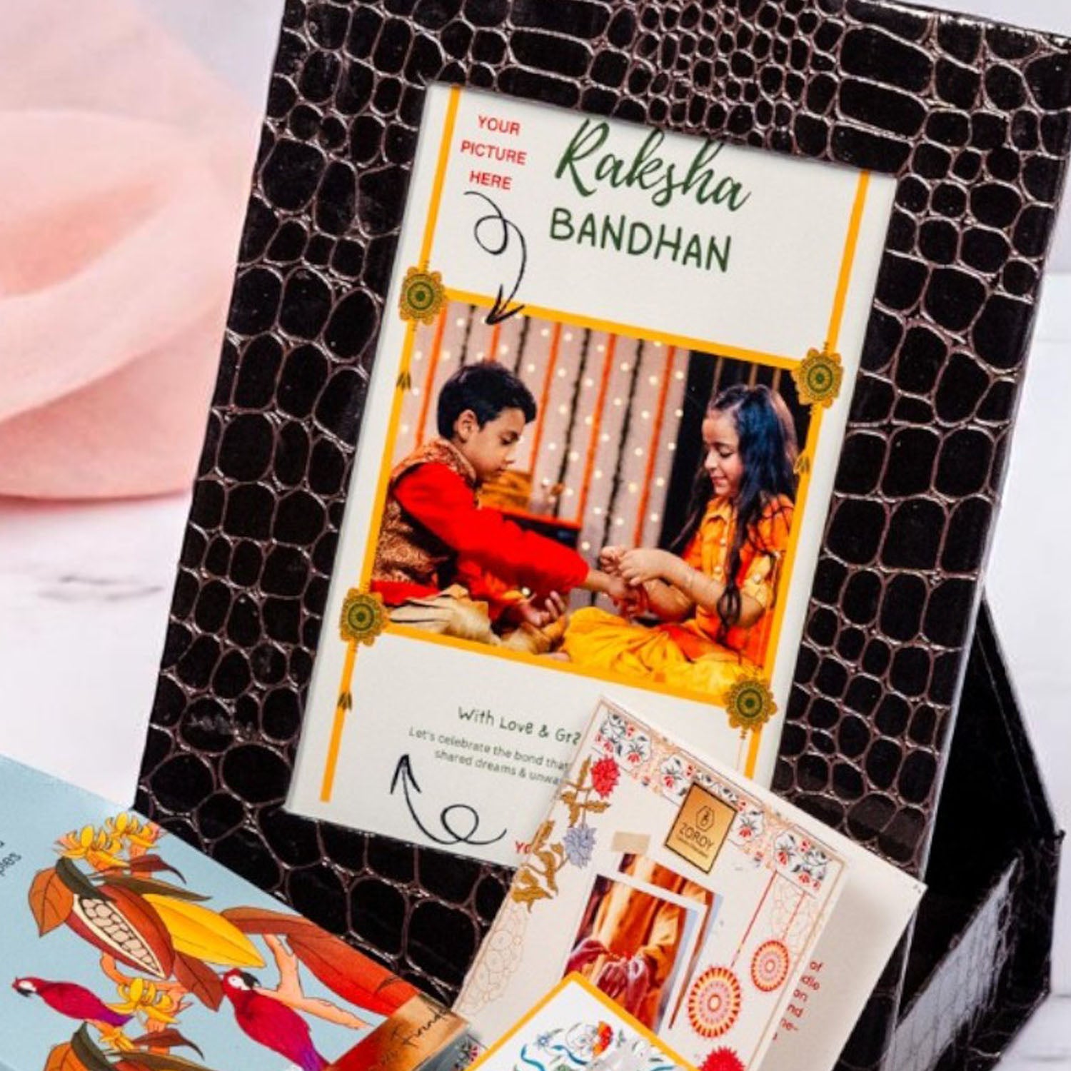 ZOROY Personalized Rakhi Photo Box Hamper – Custom Upload Picture Keepsake Rakhi Gift Box with Choco Coated Rice Crisps, 2 Rakhis, Akshat Kumkum, Rakhi Card | Raksha Bandhan Gifts for Brother