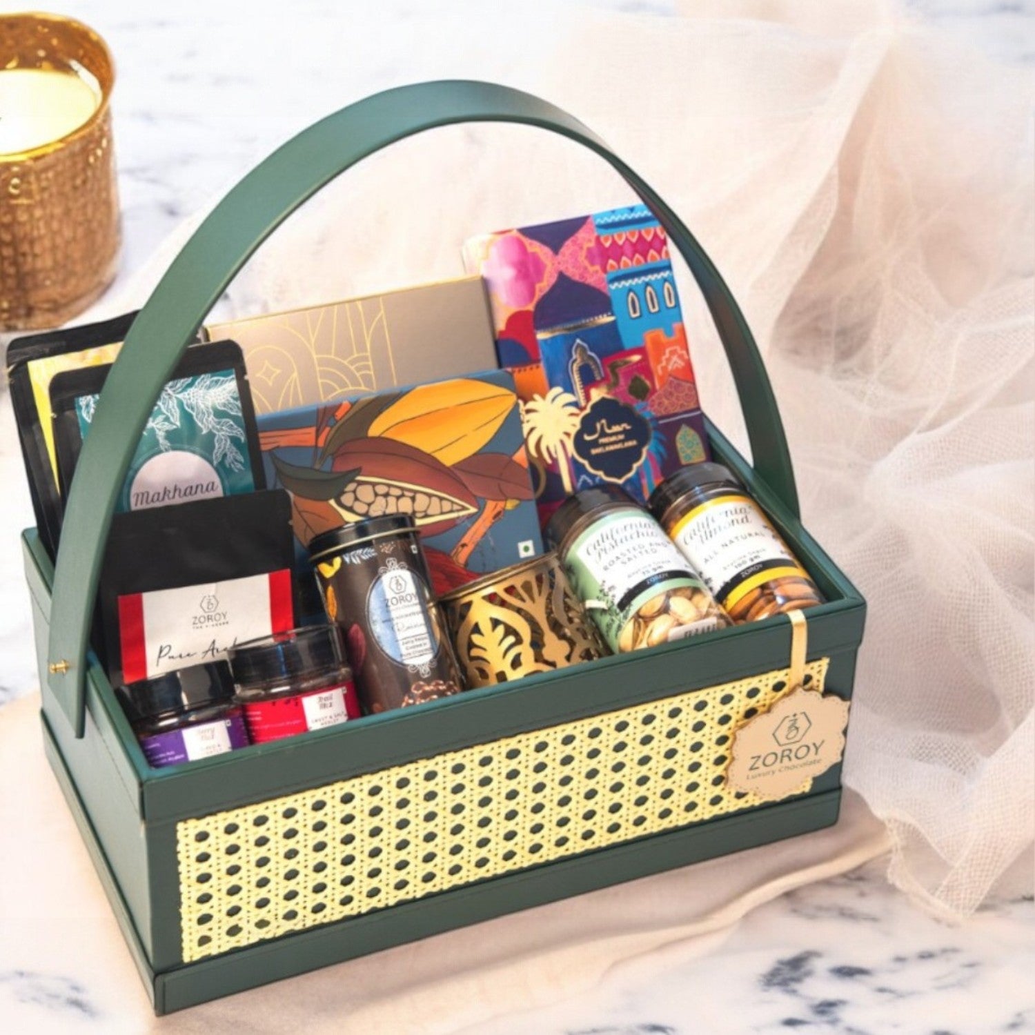 ZOROY green Luxe Rattan Hamper with Chocolates, Dry Fruits, Turkish Baklawa, Metal festive votive, arabica coffee,, mixed berries, snack packs. Perfect for everyday and festive gifting
