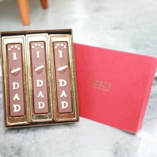 Box with 3 assorted Fathers Day chocolate bars saying " I Love dad"