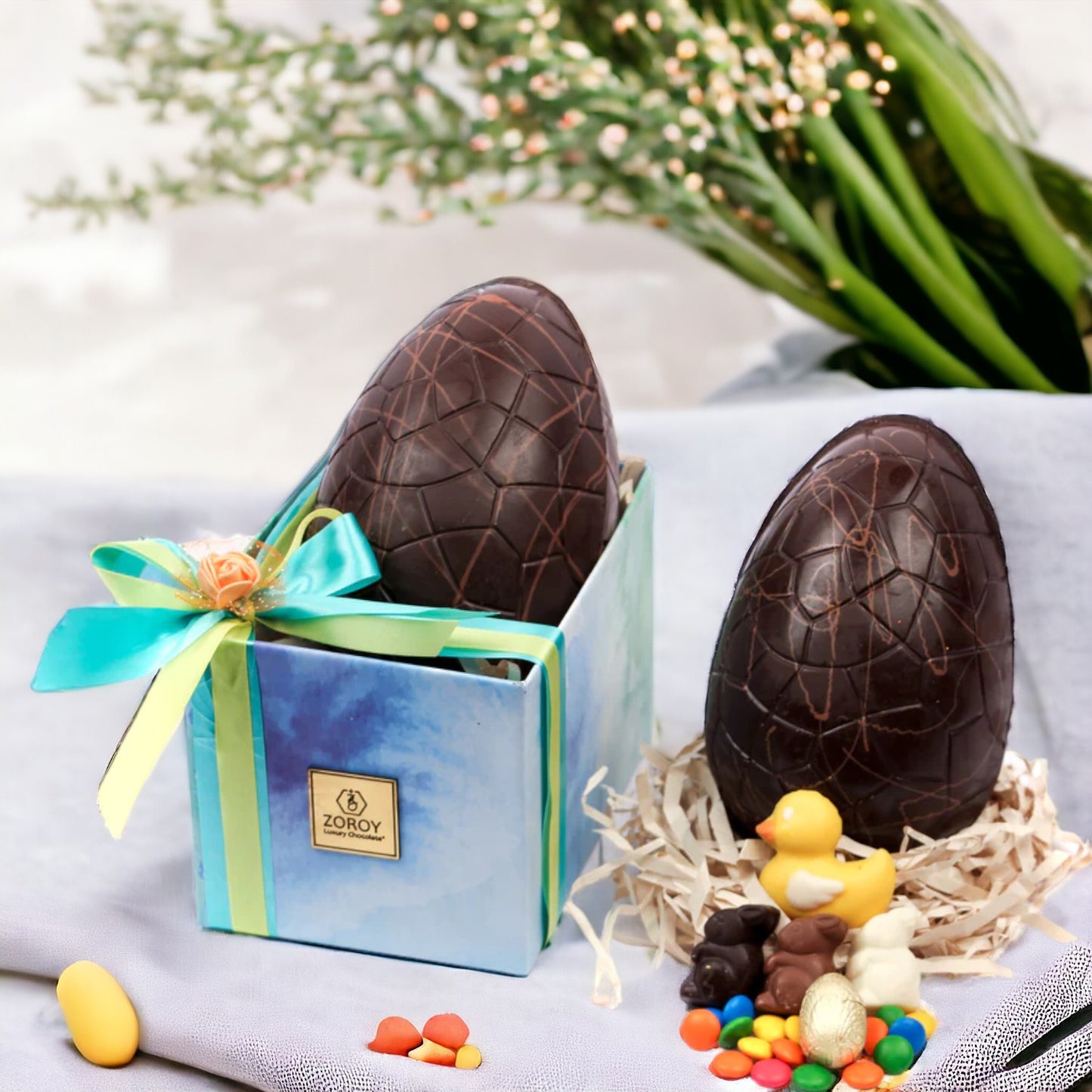ZOROY Easter Essentials Basket with Large egg's, Duck & Bunnies Chocolate Gift Hamper