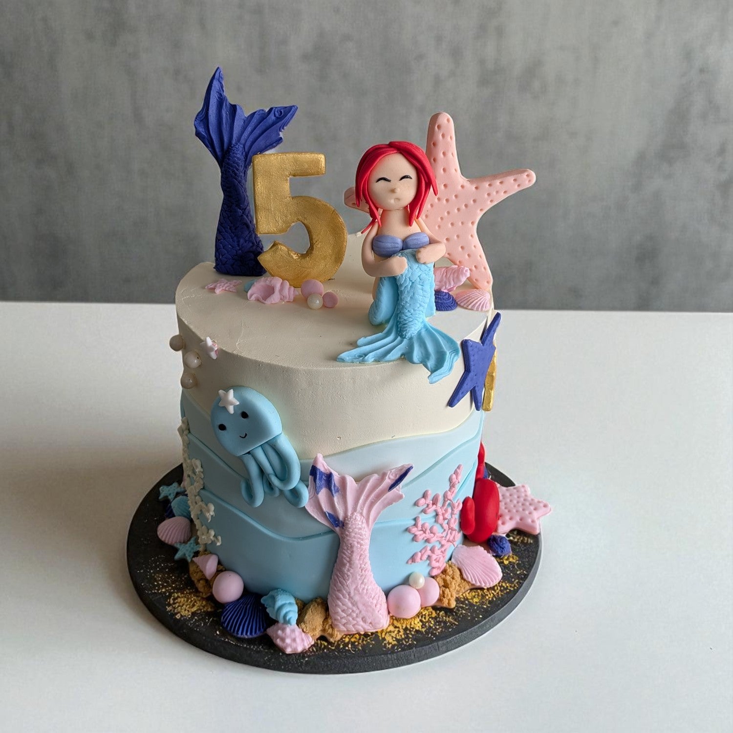 Mermaid in ocean theme cake
