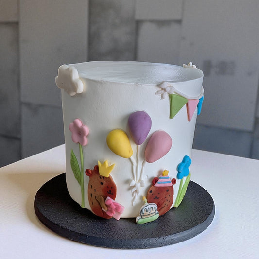 Teddy celebrating birthday cake